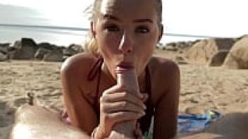 At the beach, a gorgeous blonde female gets an oral creampie and sucks my dick.