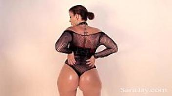 Oiled Up Sucking Cock is Sara Jay.