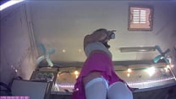 A lovely young brunette girl is preparing for her first workplace upskirt flashing session.