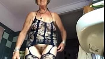 Granny in lingerie adores cucumber and hairy pussies.